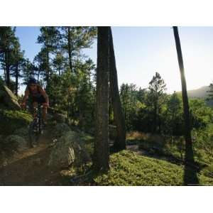  Young Woman Mountain Biking on the Centennial Trail 