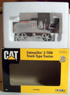  is a 1993 Ertl 1/16 scale Cat Caterpillar 2 Ton Track Type Tractor 