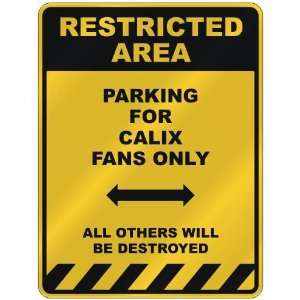 RESTRICTED AREA  PARKING FOR CALIX FANS ONLY  PARKING 