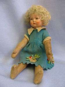 in cute dresses and curly blonde hair like this well loved little doll 