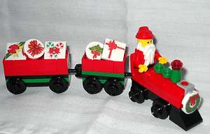   CHRISTMAS TRAIN WITH SANTA RIDING, DELIVERING PRESENTS, GIFTS  