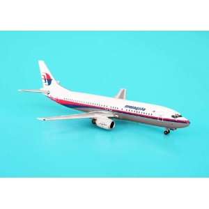    Phoenix Malaysia 737 400 1/400 REG#9M MMM Old Livery Toys & Games