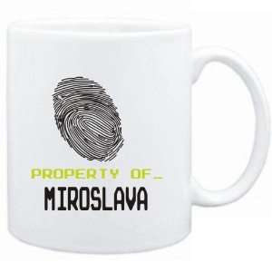  Mug White  Property of _ Miroslava   Fingerprint  Female 