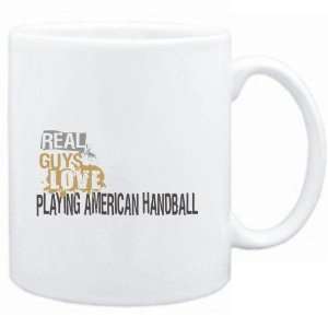  Mug White  Real guys love playing American Handball 