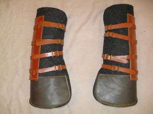 Pair professional felt shipping boots w/leather straps  