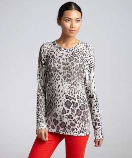 Romeo & Juliet Couture black and white mixed animal print jeweled top