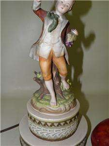   young man, with an ornate double base in good condition. Please view