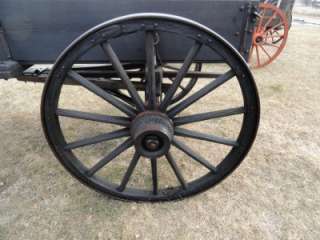 This antique horse drawn wagon is in good shape. The gear is in very 