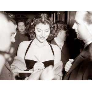 Ava Gardner Signing Autographs at a Midnight Matinee at the Colliseum 