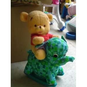   Baby Winnie the Pooh on Rocking Elephant Plush Toy Toys & Games