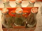 pack coca cola with vintage bottles 8 oz. 1998 grandp