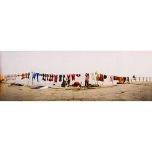  Hanging Clothes Out to Dry after Washing Them in the River 